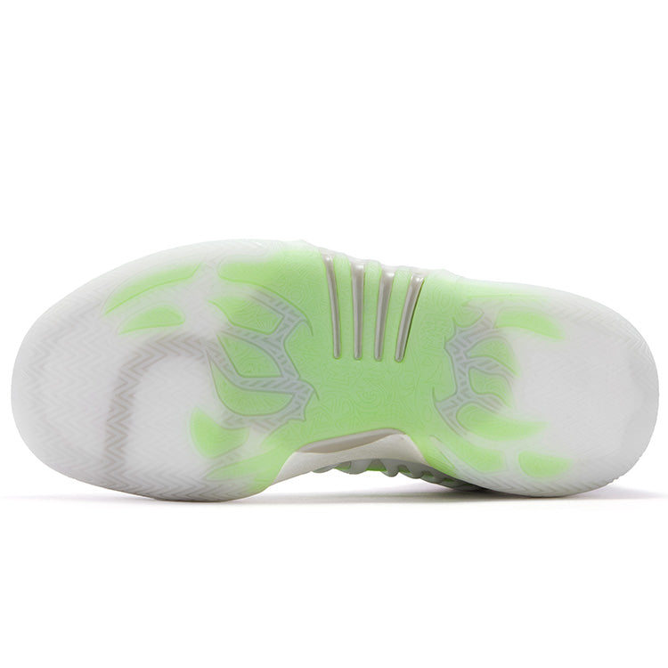 Basketball shoes outsole view: textured white tread with neon green pattern, thick sole