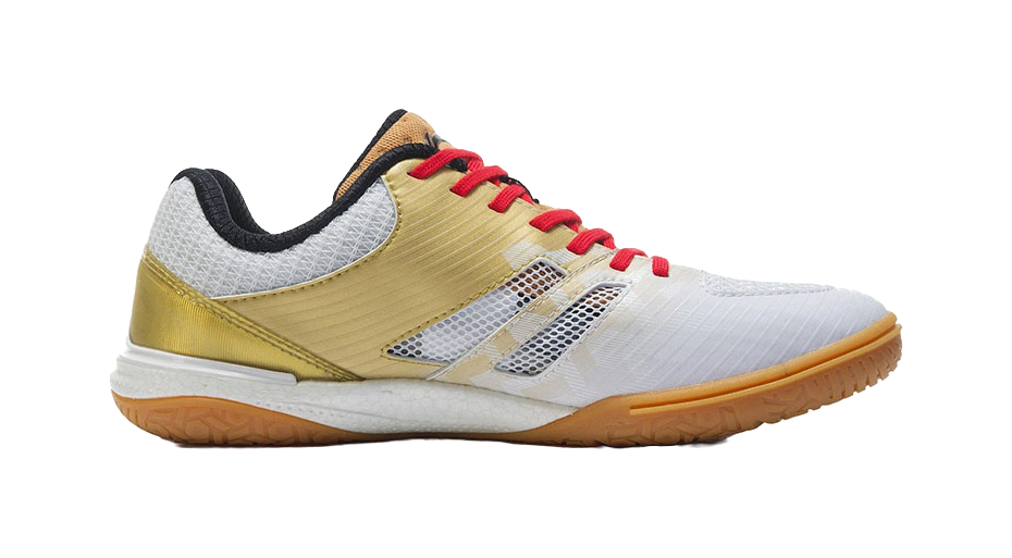 White and gold table tennis shoe with red laces and mesh side panels, front view.