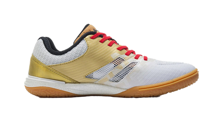 White and gold table tennis shoe with red laces and mesh side panels, front view.