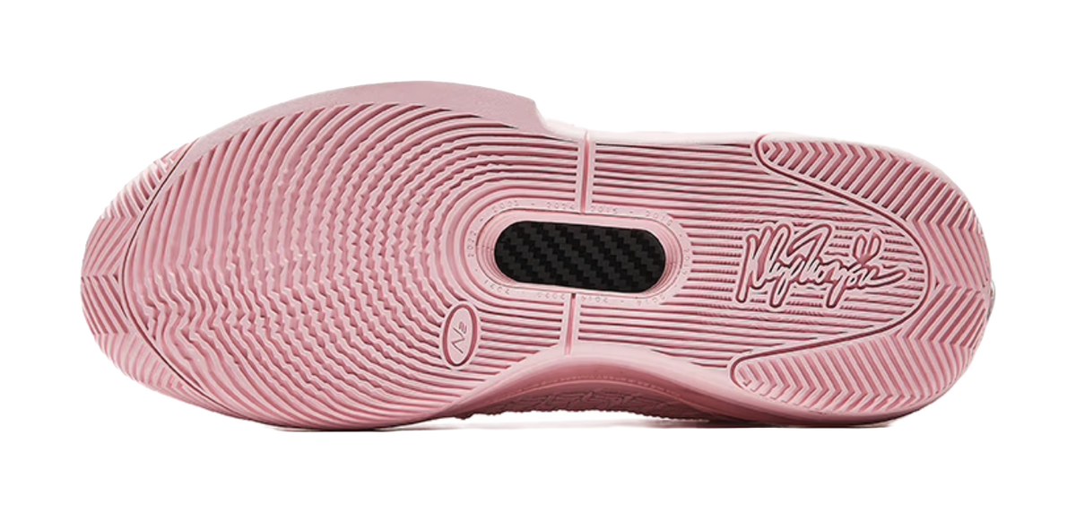 Light pink basketball shoe outsole with herringbone tread and brand logo