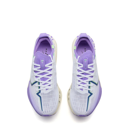 Women’s running shoes, white uppers with purple insoles and lace-up front panels