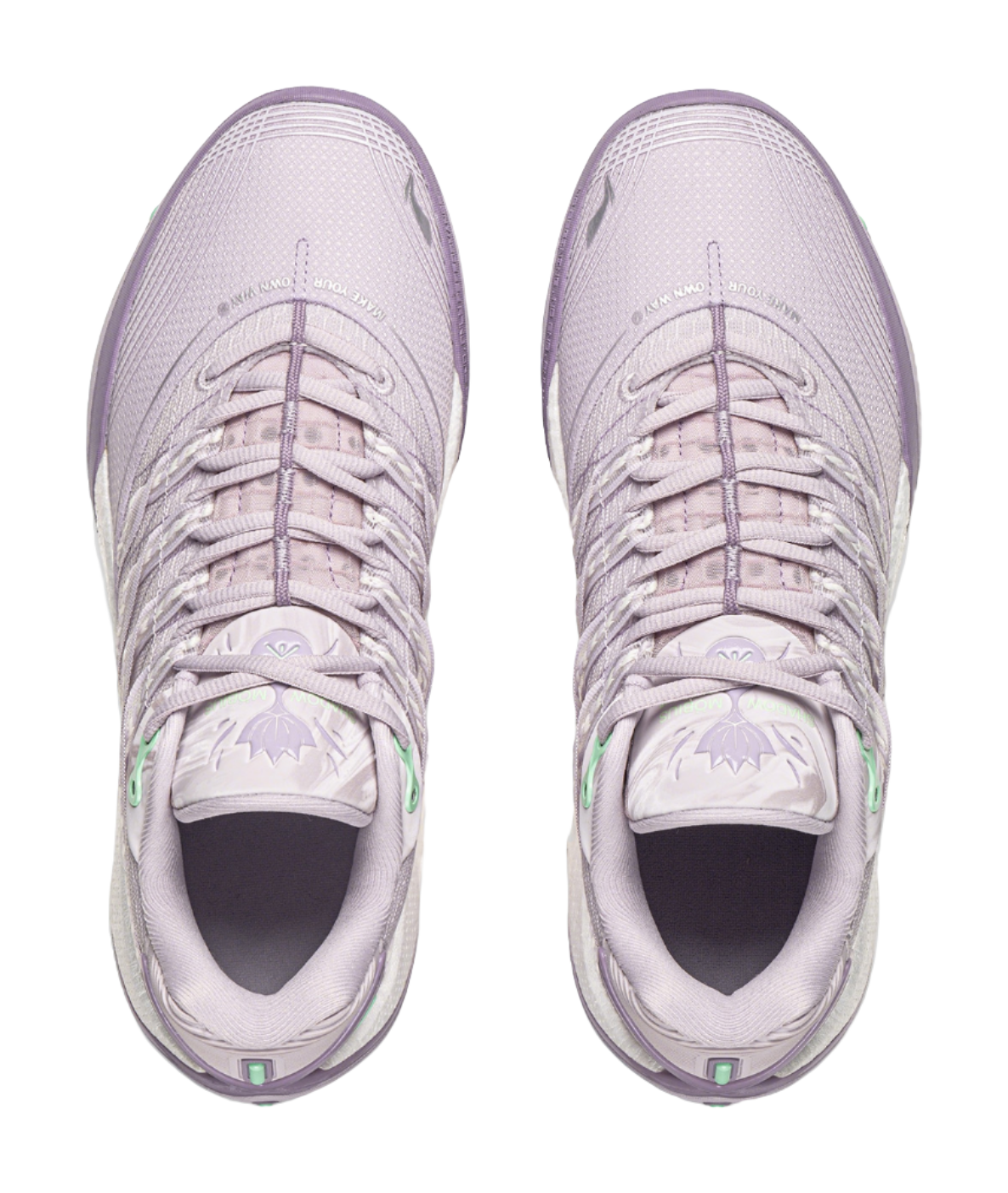 Pair of lavender low basketball shoes with lace-up uppers and cushioned collars