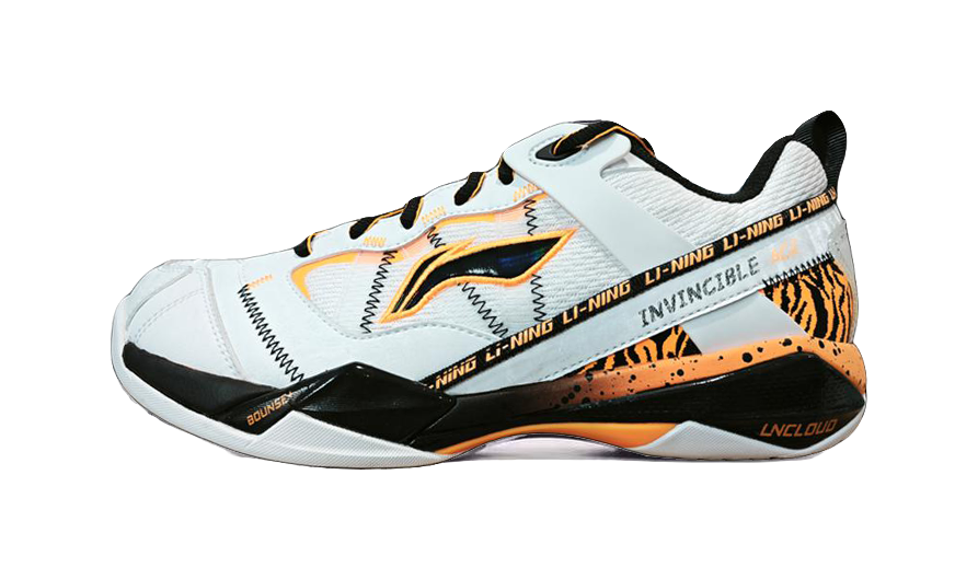 Men's white badminton shoe with tiger stripe print and orange accents, low profile