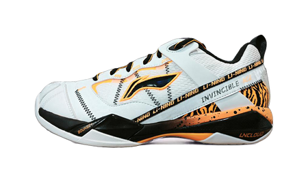 Men's white badminton shoe with tiger stripe print and orange accents, low profile