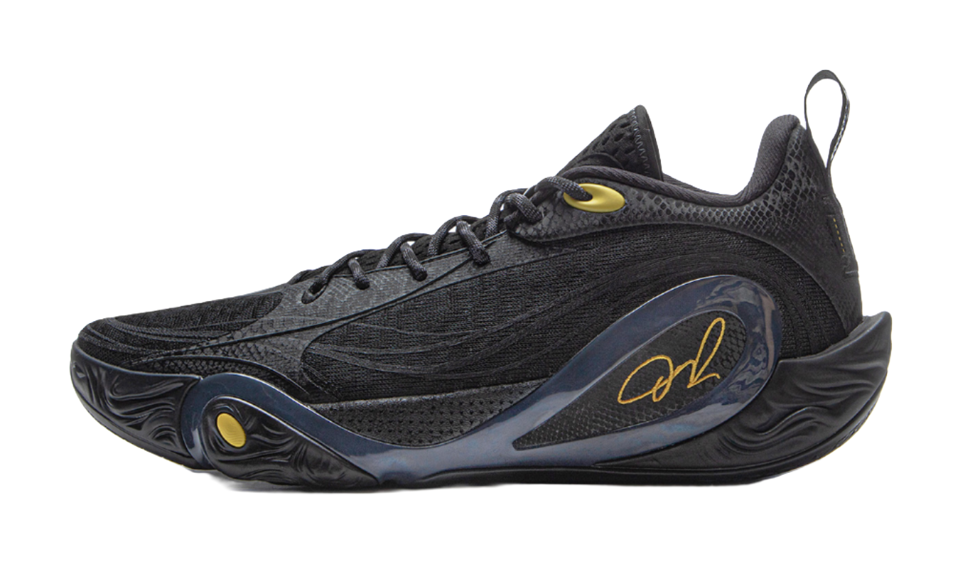 Black low-top basketball shoe with gold accents and lace-up design