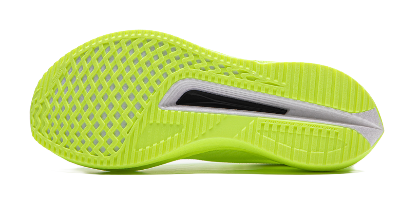 Neon yellow green running shoes, outsole side view, textured traction pattern