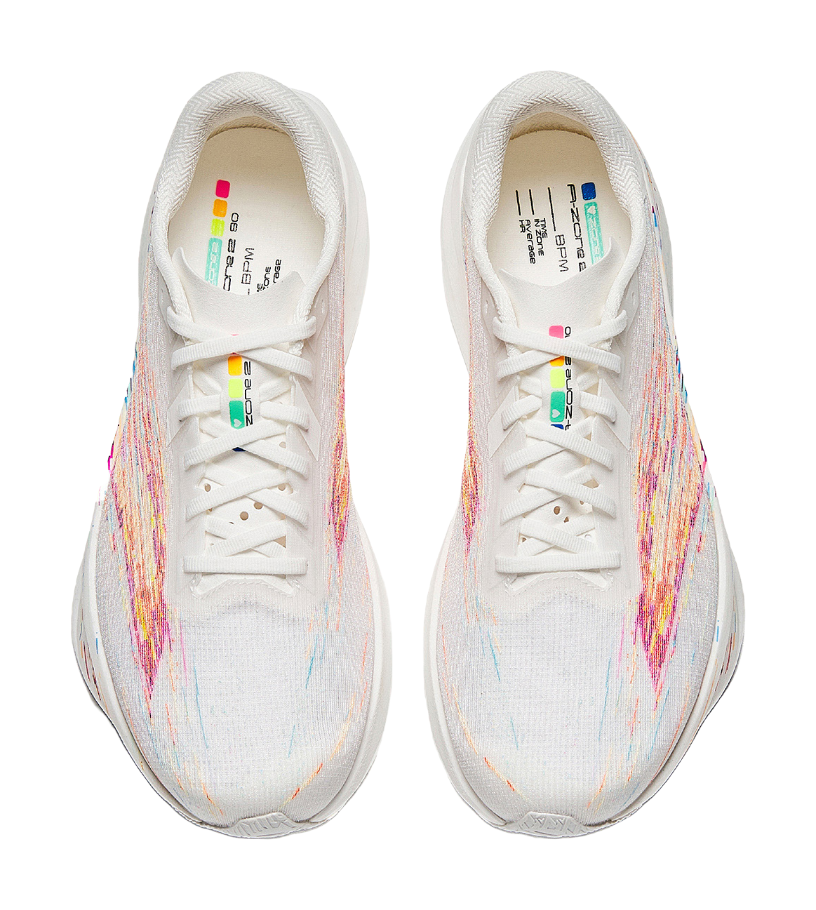 Pair of white running shoes with multicolor upper and lace eyelets