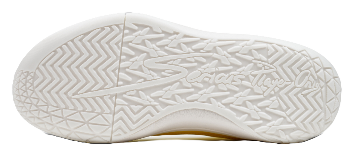 White rubber outsole with textured herringbone tread pattern