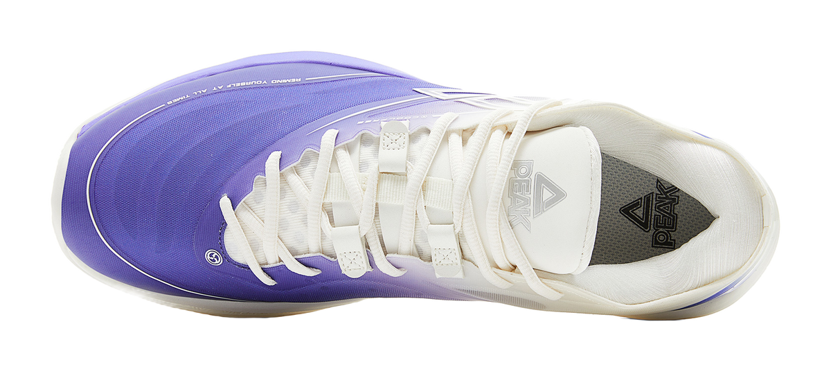 Lightweight basketball shoe side view with white laces and purple knit upper