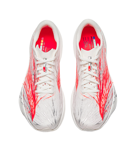 Pair of white running shoes with red patterned sides, lace-up with red interior
