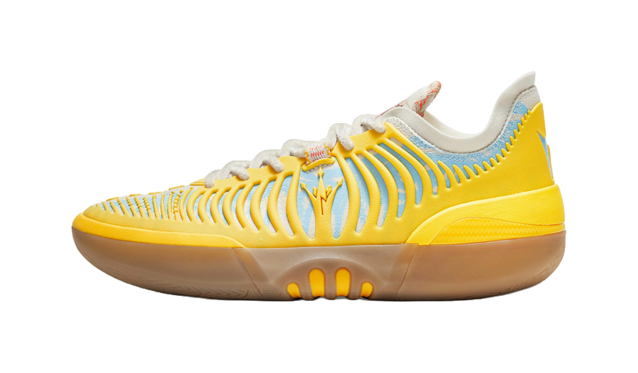 Vintage yellow low basketball shoe with lace-up front and ribbed side panels