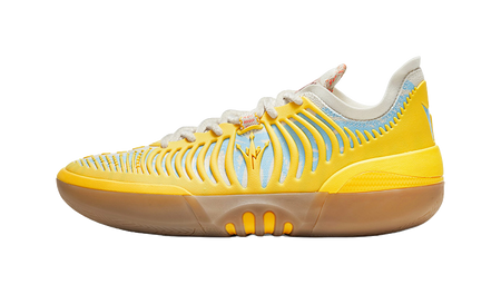 Vintage yellow low basketball shoe with lace-up front and ribbed side panels