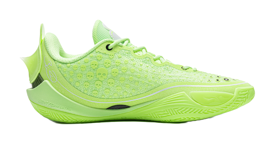 Fluorescent ice green low basketball shoe, side view with lace-up knit upper