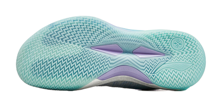 Outsole of light blue and teal low-top basketball shoe with zigzag traction pattern
