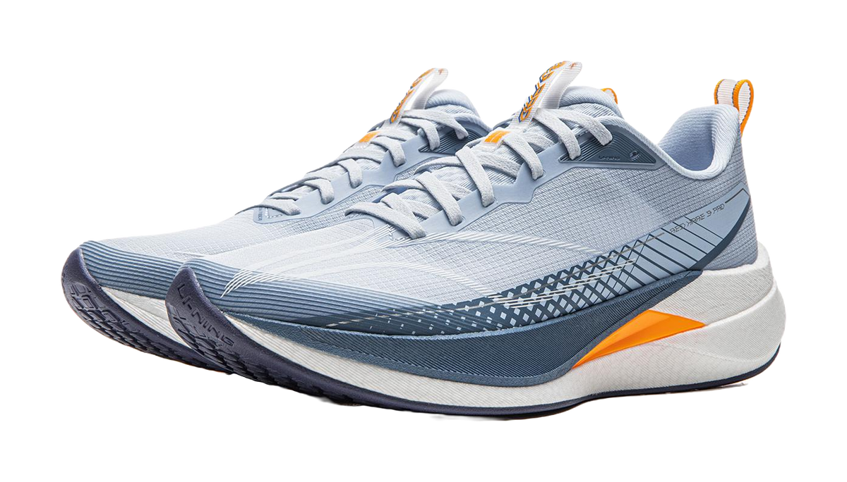 Light blue running shoe angled front with orange panel and textured navy lines