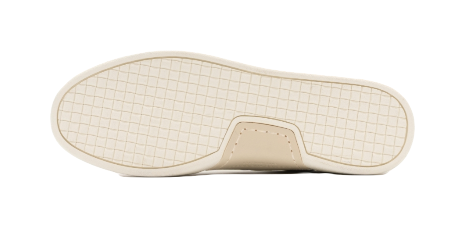 Antique white sneaker outsole with grid tread