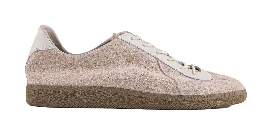 Khaki suede low-top sneakers, side view, with white eyelet patch and laces