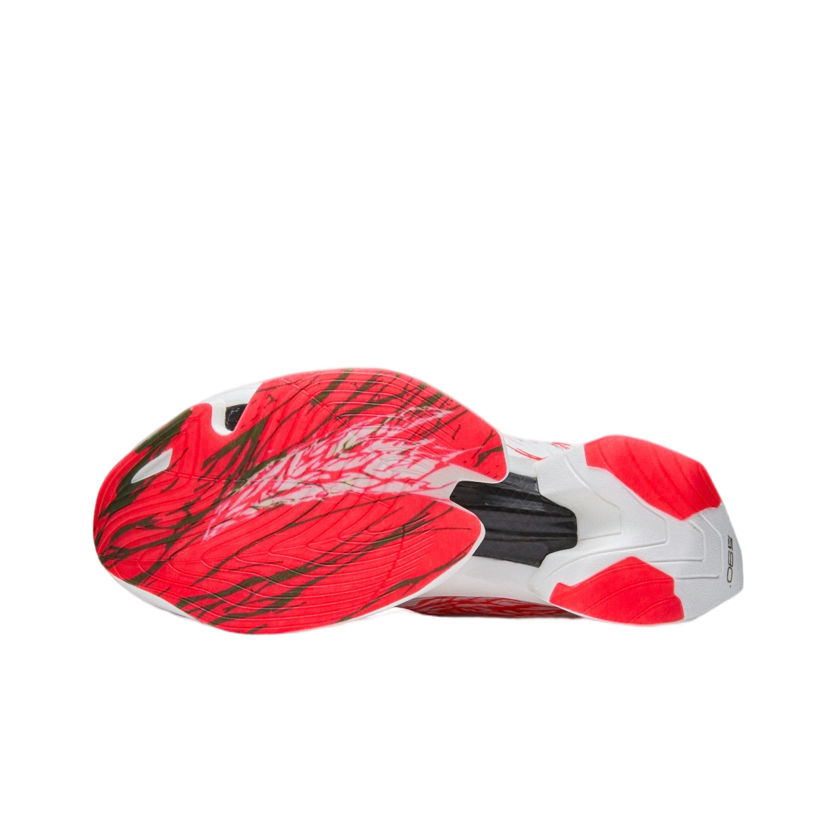 Red and white outsole view of lace-up racing running shoe