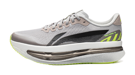 Women's low-top running shoes in calm gray with black panel and neon green sole
