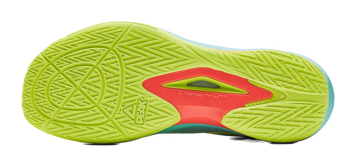 Lightweight basketball shoe outsole, neon green tread with red logo and teal edges
