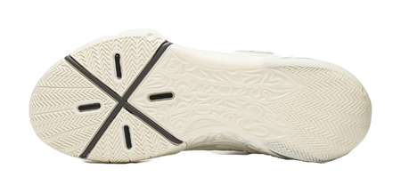 Ecru basketball shoe outsole with textured traction pattern and X-shaped grip