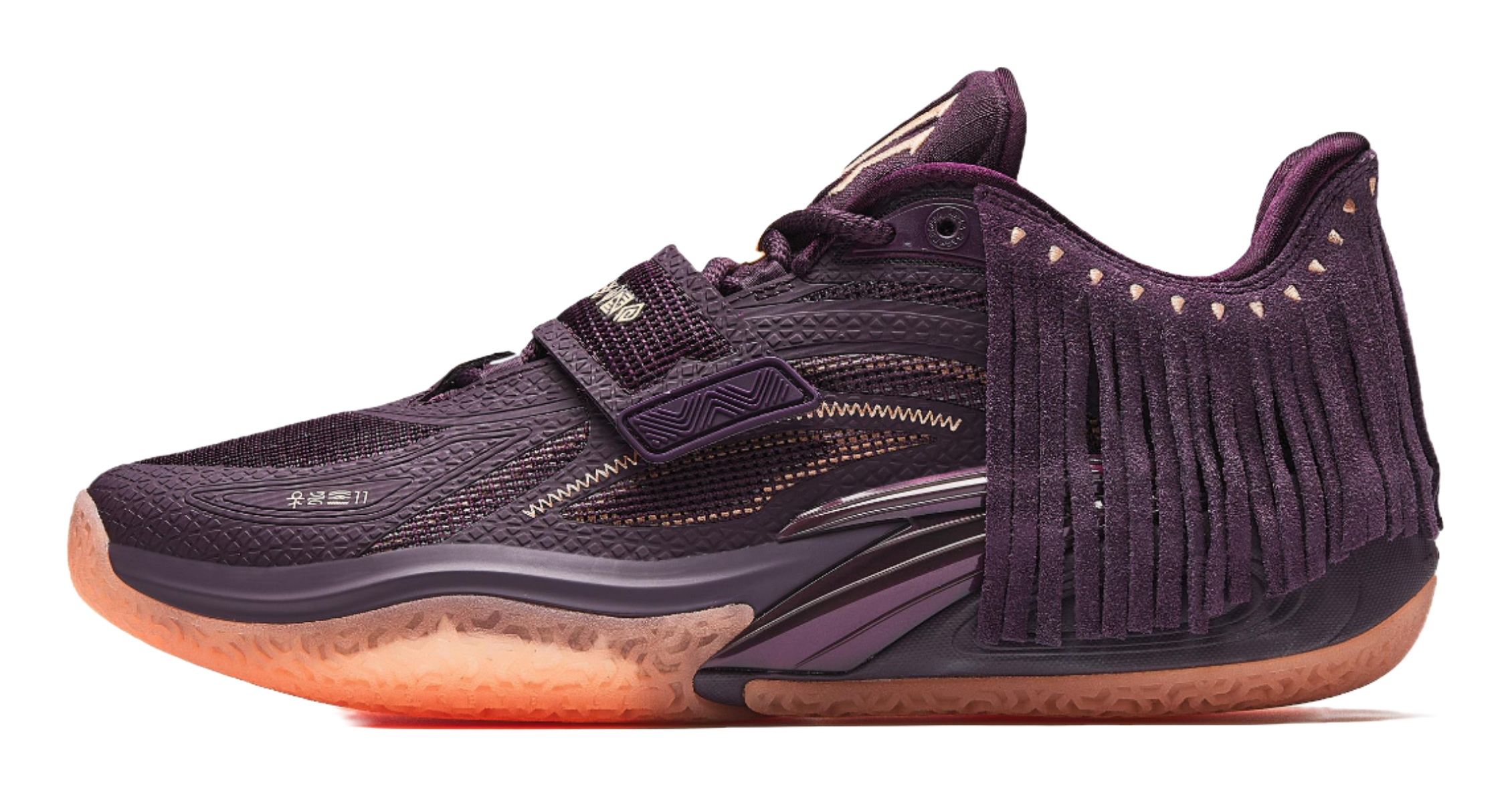 Purple basketball shoe with lace-up front, fringe collar, gold accents, textured rubber sole