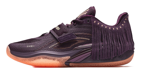 Purple basketball shoe with lace-up front, fringe collar, gold accents, textured rubber sole