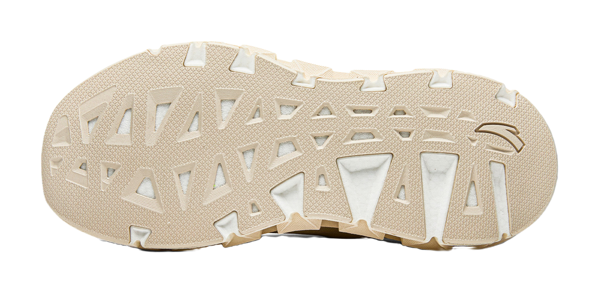 Women’s Anta running shoe outsole, textured traction tread with raised lugs.