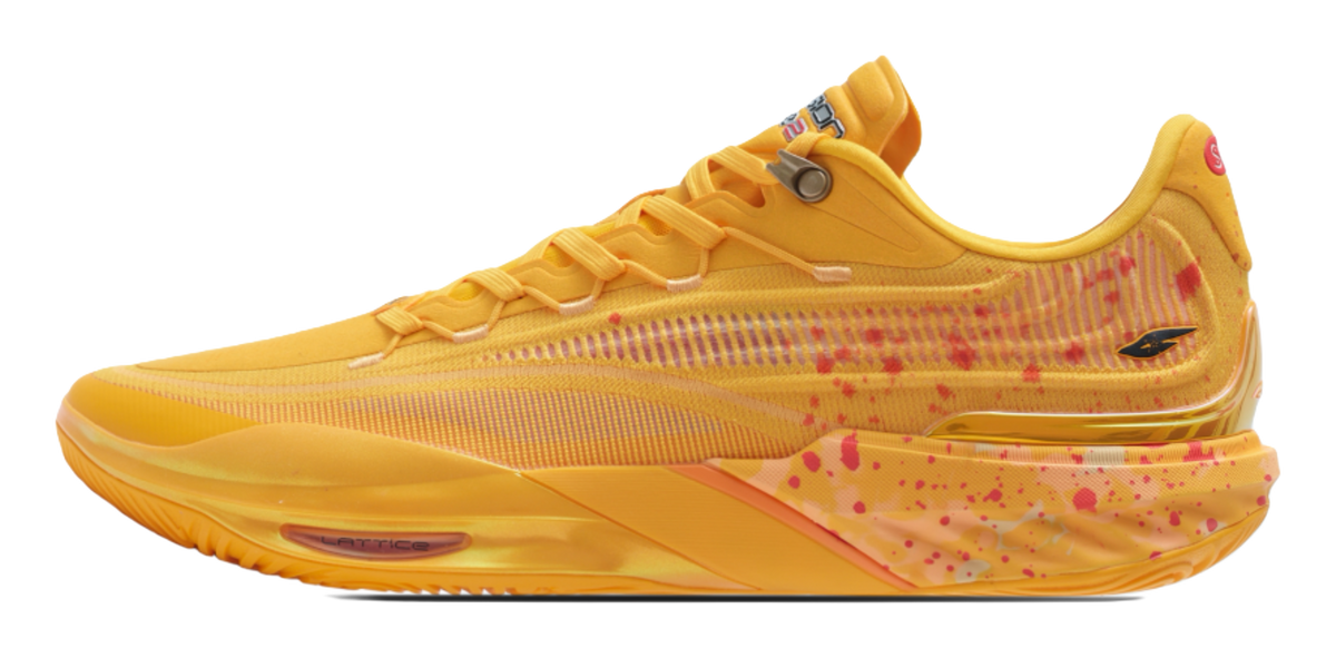 Unisex low-top basketball sneaker in bright yellow with speckled side graphics