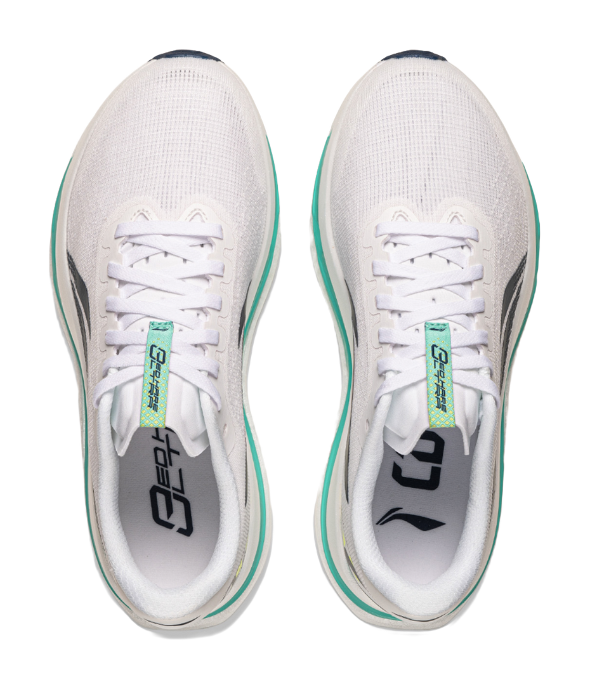 Pair of white lace-up running shoes with green-trim insole and embossed logos