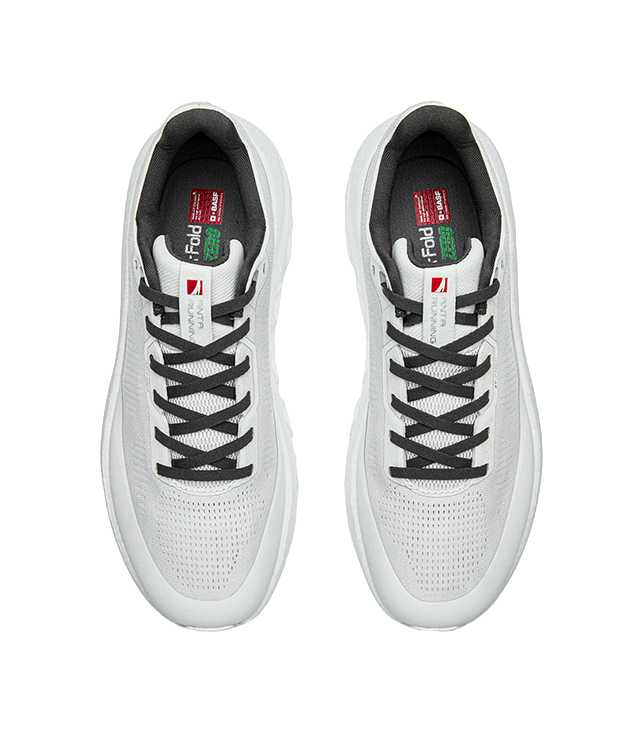 Mens low-top running shoes pair, white mesh uppers with dark lining and laces