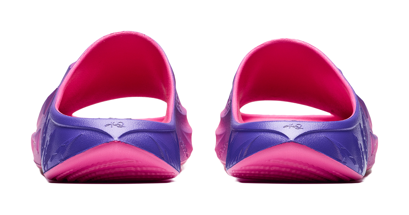Unisex slide sandal heel view with purple back panel and pink open-heel lining