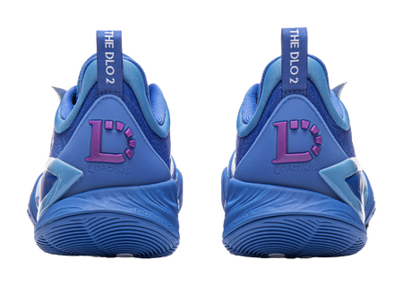 Blue basketball shoe heels with purple accent logo and cushioned back tab