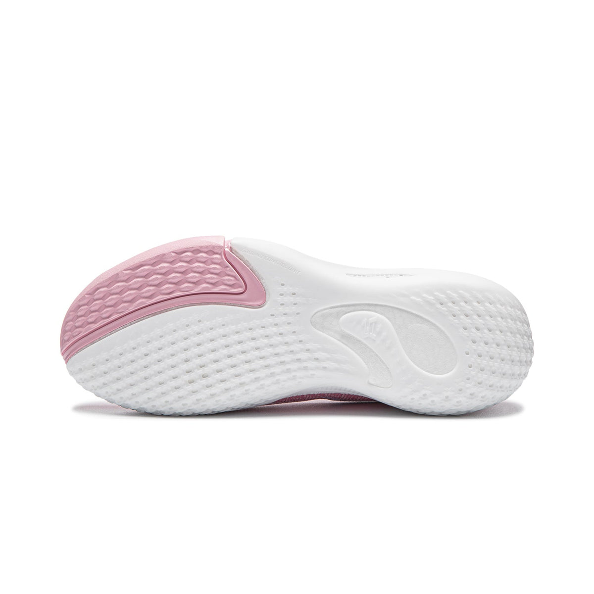 Pink and white basketball shoe outsole with textured rubber tread