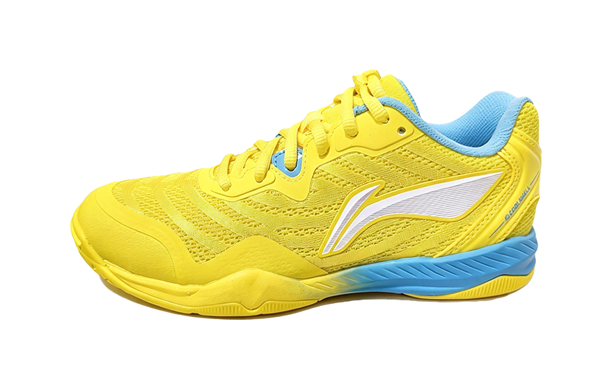 Yellow table tennis shoe with blue collar, white logo, and patterned upper