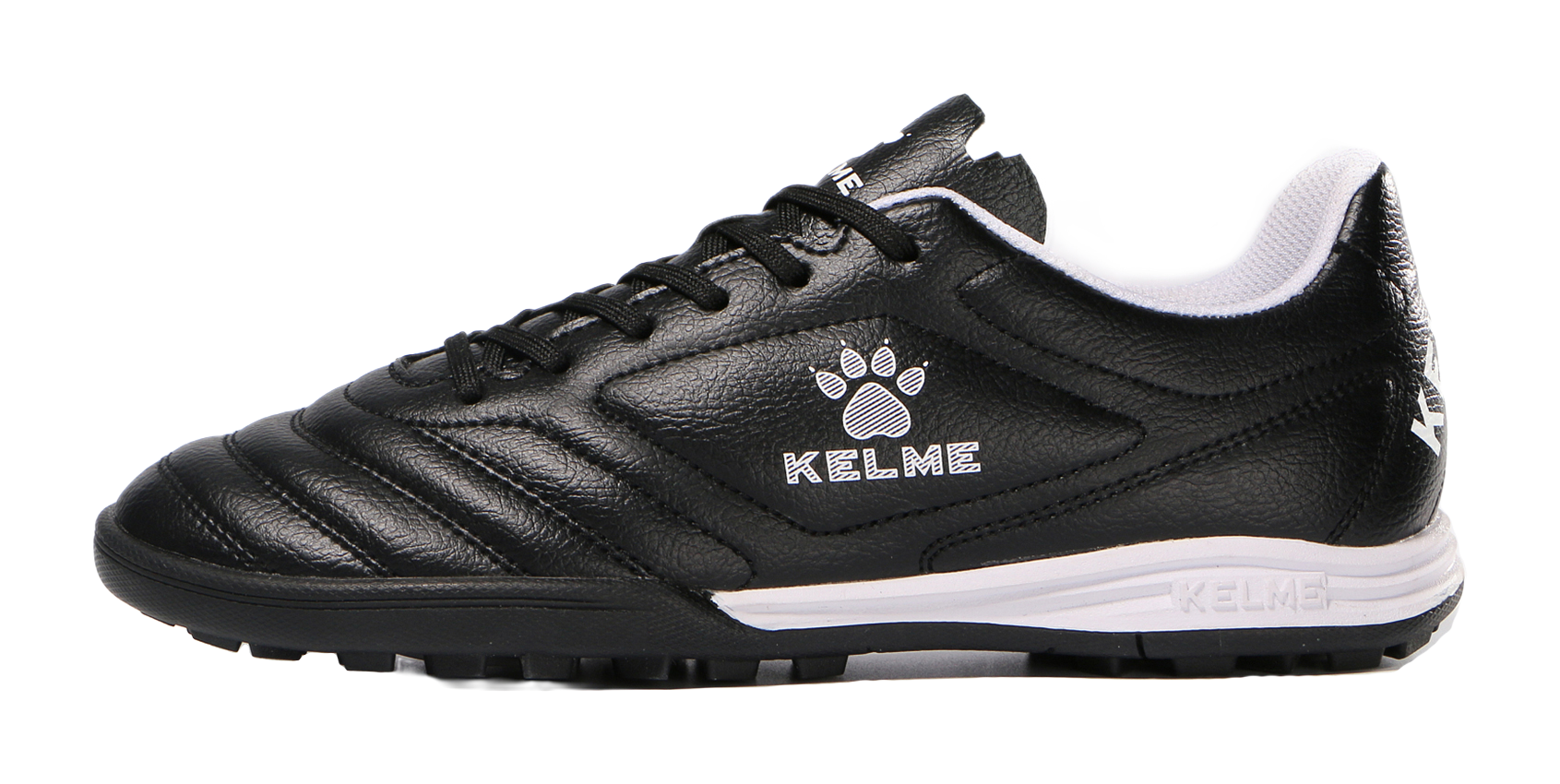 Black TF training soccer shoe with lace-up, KELME logo, and white midsole