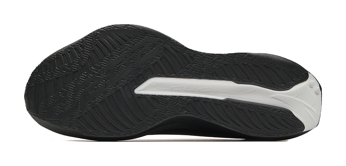 Men's low-top running shoe outsole with black tread and white traction patch