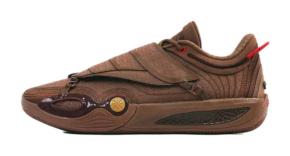 Brown basketball shoe with textured upper, red laces, and side logo detail