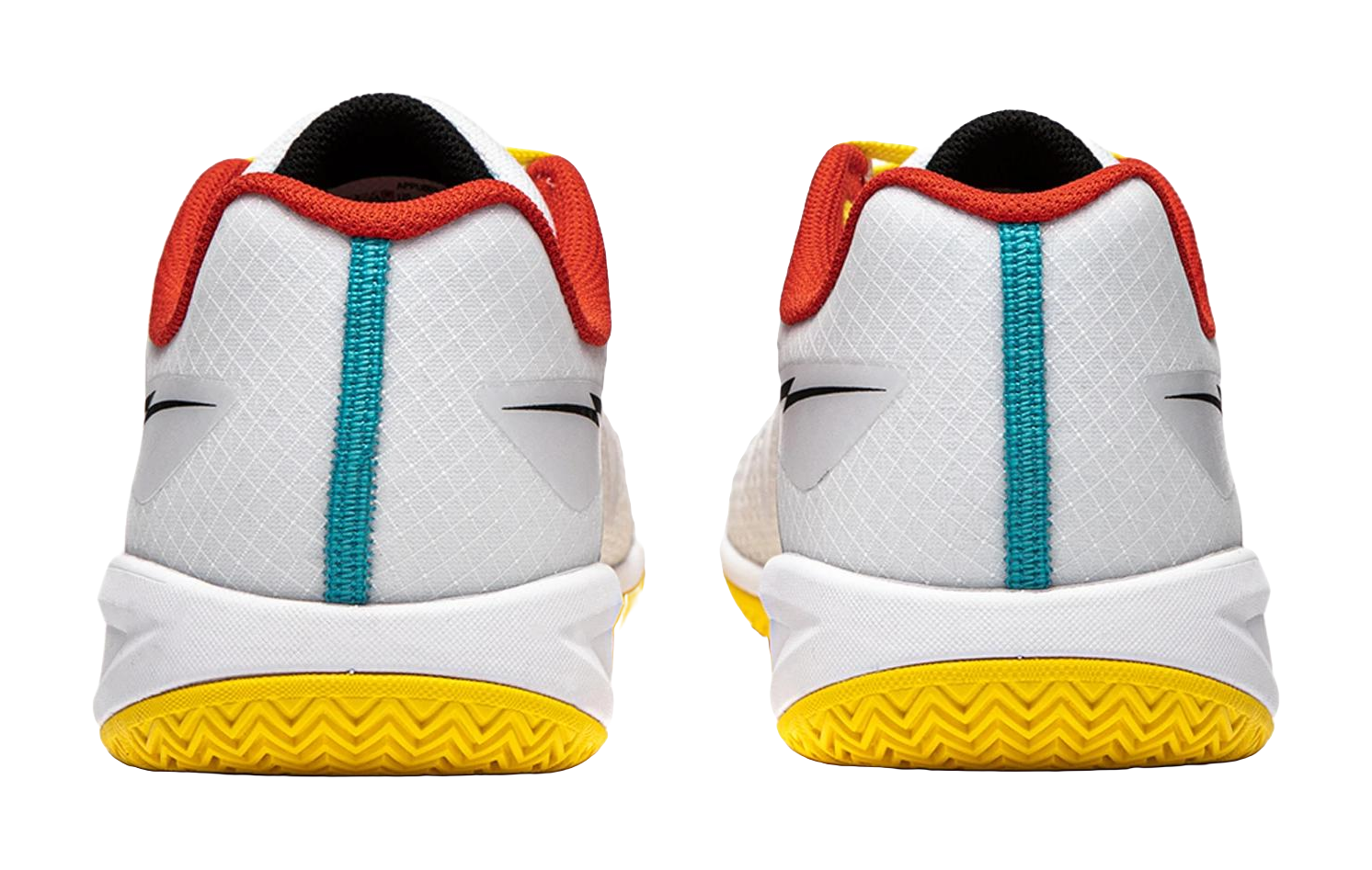 Pair of white table tennis shoes showing heels, red collars, teal strap, yellow outsole