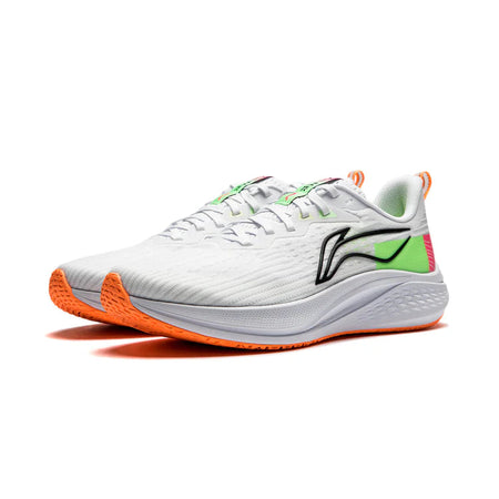 Men's running shoes angled view with white upper, green stripe, black logo, orange sole