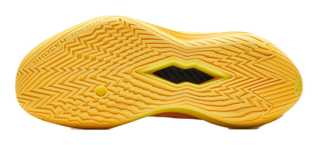 Basketball shoe outsole bottom in yellow with zigzag traction pattern and central diamond grip.