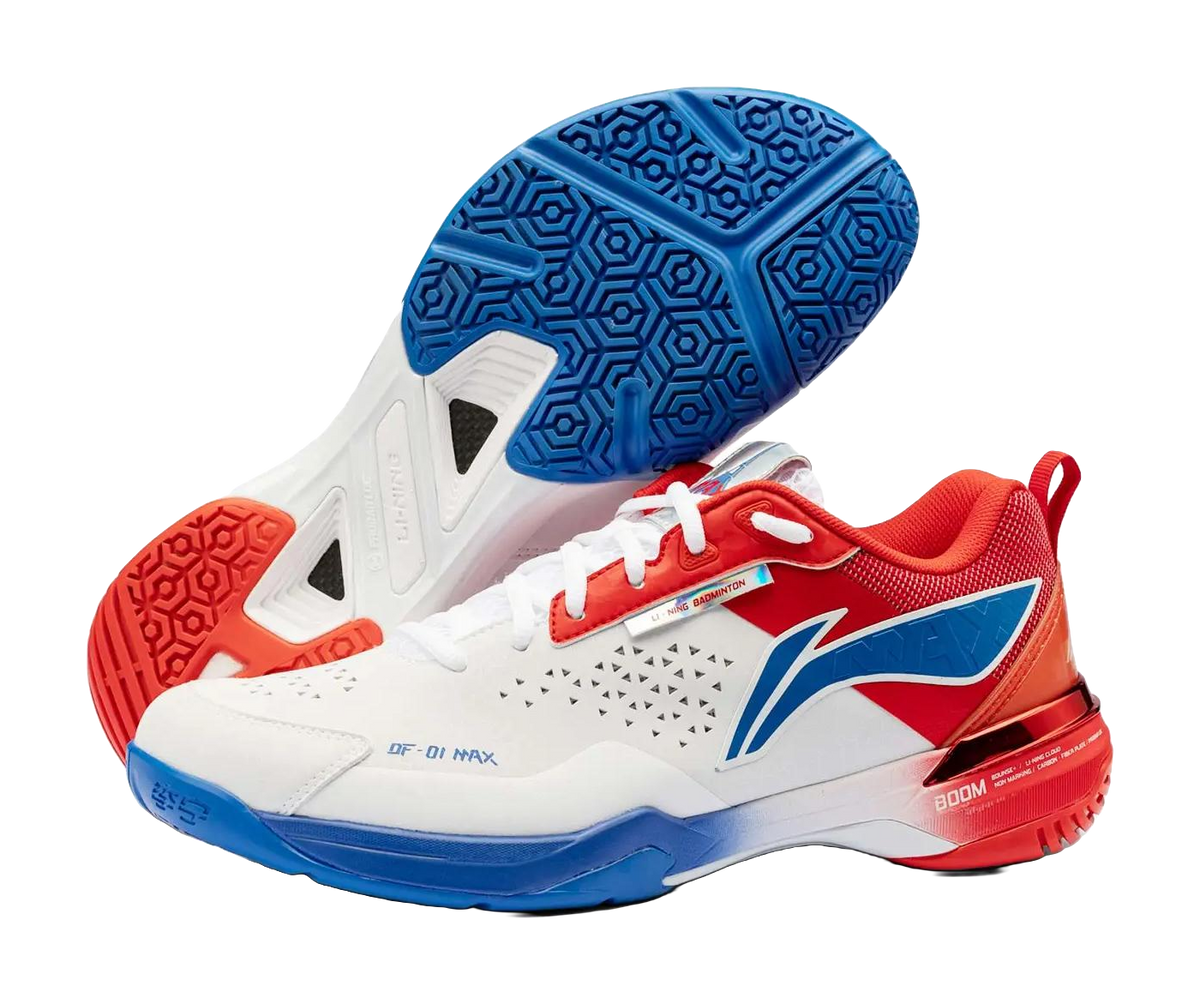 White, red, and blue unisex badminton shoe showing treaded outsole patterns