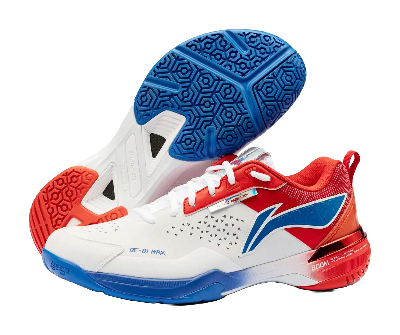 White, red, and blue unisex badminton shoe showing treaded outsole patterns