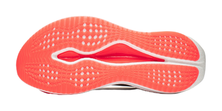 Shoe outsole with red-orange rubber tread and raised traction pattern