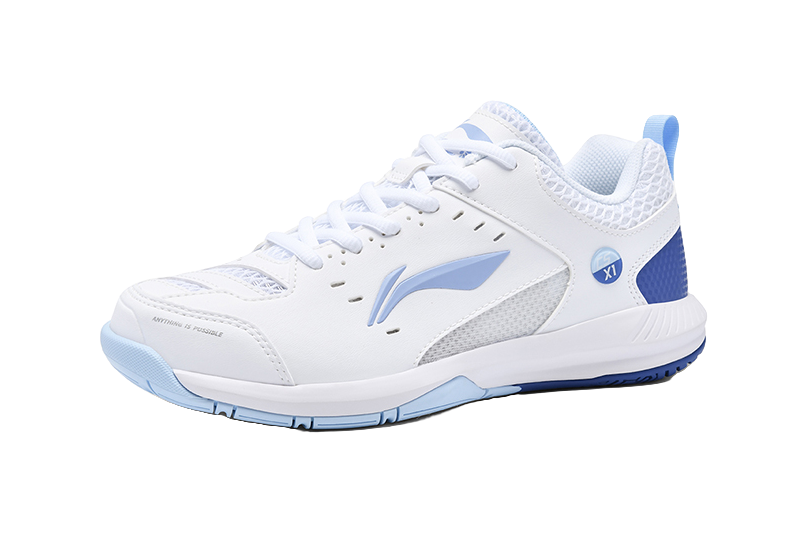 White badminton shoe side view with blue swoosh logo and cushioned sole