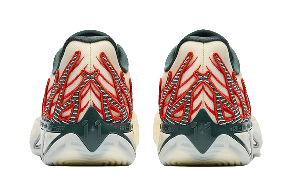 Beige basketball shoes with red winged heel graphic and teal heel collar.