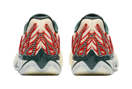Beige basketball shoes with red winged heel graphic and teal heel collar.