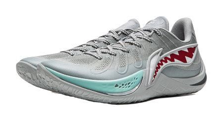 Gray basketball shoe with teal trim, red shark graphic, and laces