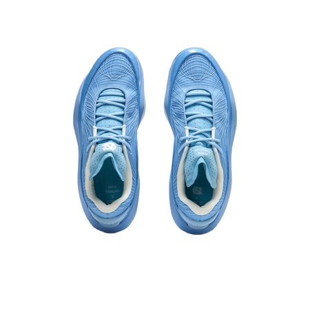 Top view of blue basketball shoes with lace-up closure and padded collar