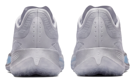 Silver low-top basketball shoes, back view, perforated heel and lace eyelets